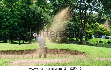 CHIANGRAI,THAILAND-AUG 22 : Thai young golf player Pongsagorn Panyasu in action during practise before enter golf tournament on August 22,2015 at golf course in Chiang rai,Thailand