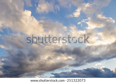 Sky background with white clouds during sunset
