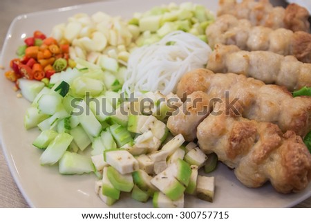 Fresh Vietnamese food set , Grilled pork with vegetables and wrapping flour