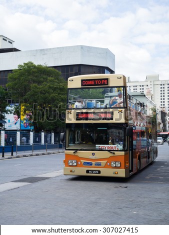 Penang, Malaysia. Aug 12 : A Travel Shuttle Bus On The Road For Traveller on 12 August 2015.