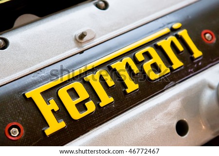 stock photo MODENA ITALY JULY 09 Logo Ferrari on motor of sport