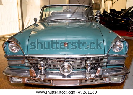 MOSCOW, RUSSIA - AUGUST 27: Green old Russian cabriolet ZIL at Moscow International exhibition InterAuto on August 27, 2008 in Moscow, Russia.