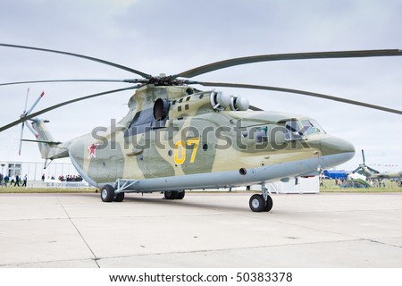 MOSCOW, RUSSIA - AUGUST 22:  Green and grey military Helicopter with propellers at Moscow International airshow MAX 2009 on August 22, 2009 in Moscow, Russia.