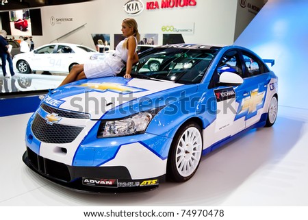 MOSCOW, RUSSIA - AUGUST 25:  White and blue sport car Chevrolet Cruze on display at the Moscow International exhibition InterAuto on August 25, 2010 in Moscow, Russia.