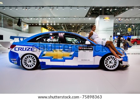 MOSCOW, RUSSIA - AUGUST 25:  White and blue sport car Chevrolet Cruze  on display at Moscow International exhibition InterAuto on August 25, 2010 in Moscow, Russia.