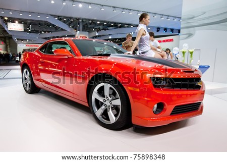 MOSCOW, RUSSIA - AUGUST 25:  Red sport car Chevrolet Camaro  on display at Moscow International exhibition InterAuto on August 25, 2010 in Moscow, Russia.