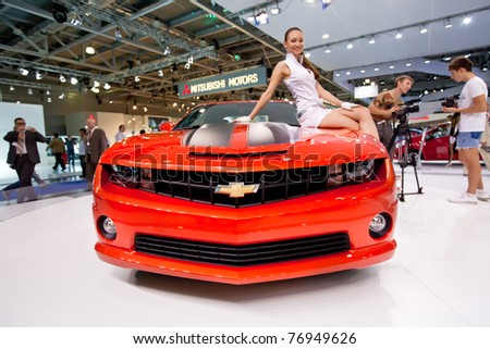 MOSCOW, RUSSIA - AUGUST 25:  Red sport car Chevrolet Camaro on display at Moscow International exhibition InterAuto on August 25, 2010 in Moscow, Russia.