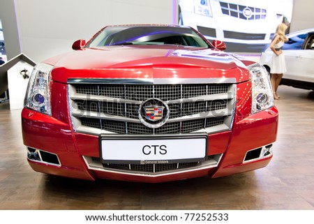 MOSCOW, RUSSIA - AUGUST 25:  Red car Cadillac CTS on display at Moscow International exhibition InterAuto on August 25, 2010 in Moscow, Russia.