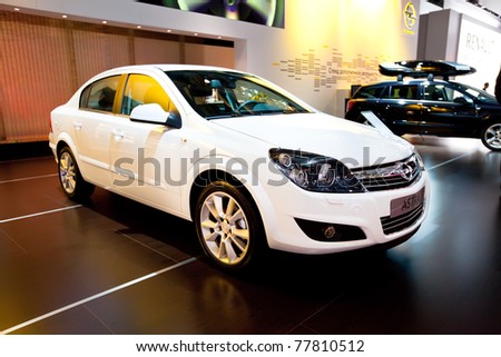 stock photo : MOSCOW, RUSSIA - AUGUST 25: White car Opel Astra on display