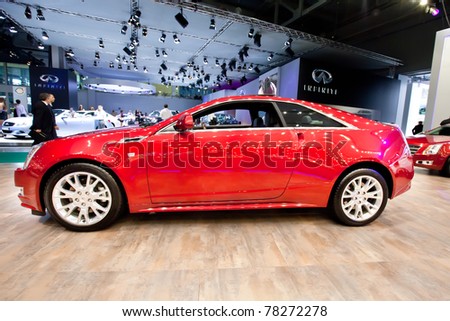 MOSCOW, RUSSIA - AUGUST 25:  Red car Cadillac CTS on display at Moscow International exhibition InterAuto on August 25, 2010 in Moscow, Russia.