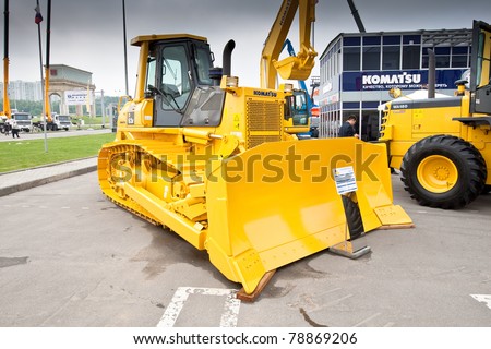MOSCOW, RUSSIA - JUNE 02:  Yellow diesel bulldozer on display at Moscow International exhibition Construction equipment and technologies on JUNE 02, 2010 in Moscow, Russia.