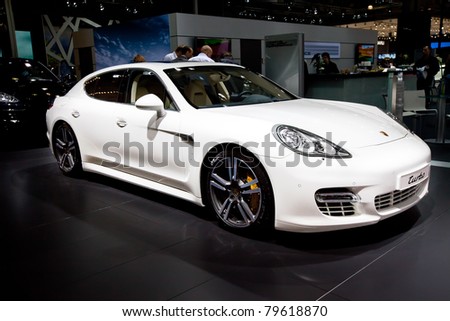 MOSCOW, RUSSIA - AUGUST 25: White sport car Porsche  Turbo  on display at Moscow International exhibition InterAuto on August 25, 2010 in Moscow, Russia.