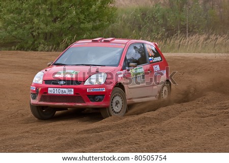 ROSTOV, RUSSIA - SEPTEMBER 05: Artur Pirozhkov drives a red Ford Fiesta car during Rostov Velikiy Russian rally championship on September 05, 2010 in Rostov, Russia.