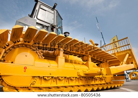 MOSCOW, RUSSIA - JUNE 02:  Yellow diesel bulldozer on display at Moscow International exhibition Construction equipment and technologies on JUNE 02, 2010 in Moscow, Russia.
