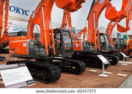 MOSCOW, RUSSIA - JUNE 02:  Orange diesel excavator on display at Moscow International exhibition Construction equipment and technologies on JUNE 02, 2010 in Moscow, Russia.
