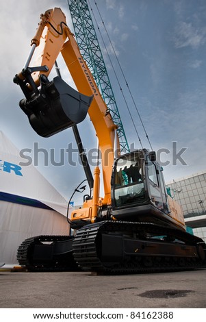 MOSCOW, RUSSIA - JUNE 02:  Yellow diesel excavator on display at Moscow International exhibition Construction equipment and technologies on JUNE 02, 2010 in Moscow, Russia.