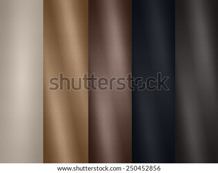 Closeup of detailed leather texture background palette samples. White Light brown, brown, grey and black