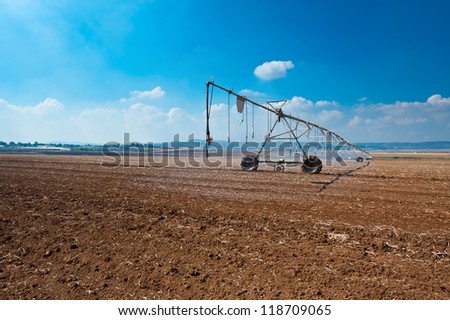 Sprinkler Irrigation on a Plowed Field in Israel