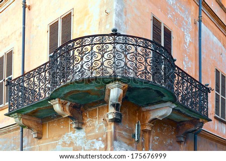 Facade of the Old Italian House with Balcony