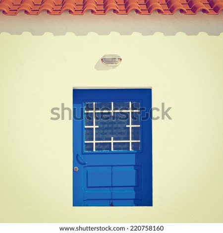 Wooden Door in the White Wall of Portuguese Home, Instagram Effect