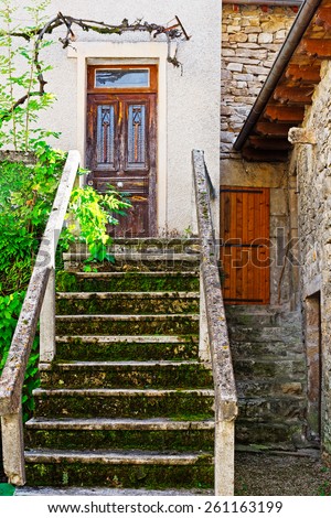 Porch and Wooden Door in the Courtyard of the  French House