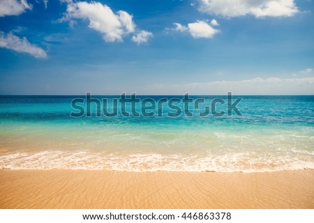 Sea view from tropical beach with sunny blue sky. Tropical sea beach in Bali. Summer sea in Bali. Summer beach with blue sea water. Paradise beach and summer sea, Bali. Sea relax. Blue sea water, Bali