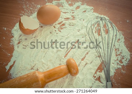baking cake with egg background -vintage (retro) style color effect