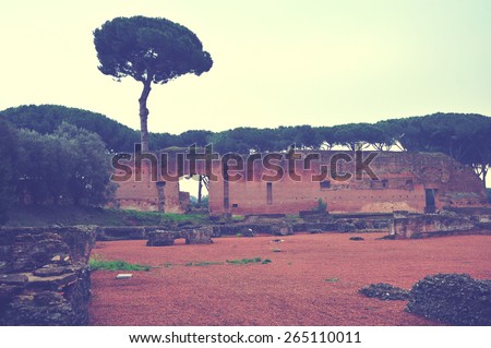 Vintage italy background. Rome vintage landscape with trees. Ancient rome buildings and constructions. Ancient ruins. Beautiful view with trees and ruins. Parks and recreation.