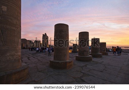 Kom Ombo, Egypt - January 2010: Visitors in the archaeological site at sunset