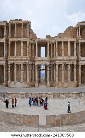 Sabratha, Libya - April 2009: Visitors in the Roman theater of the archaeological site