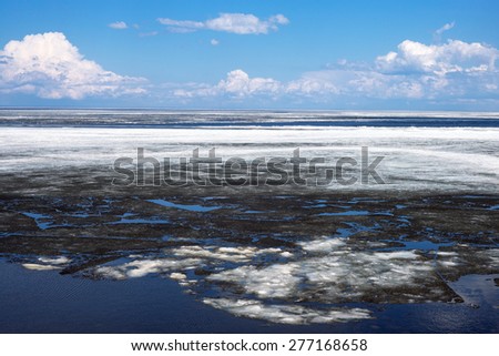Canada, Quebec, Roberval, an area still frozen of the St Jean lake
