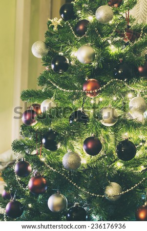 Christmas tree with red, black and silver ornaments