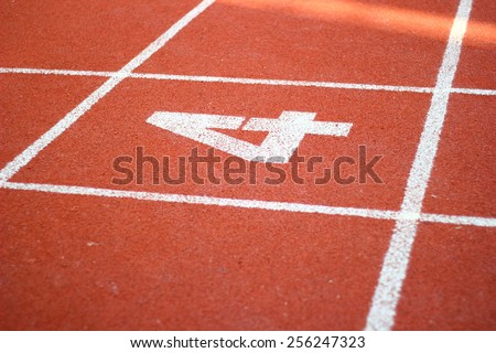 Number four on athletics all weather running track/Number Four On Running Track