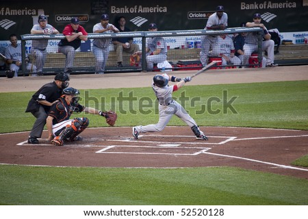 BALTIMORE - MAY 1: Dustin Pedroia of the Boston Red Sox swings at a pitch during a game at Camden Yards on May 1, 2010 in Baltimore, Maryland