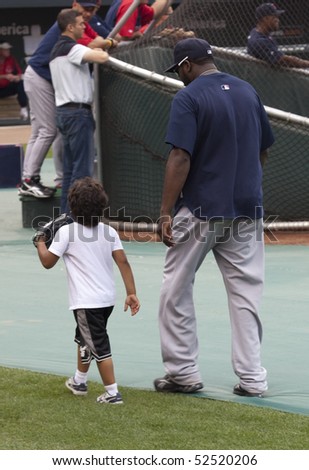 BALTIMORE - MAY 1: David Ortiz and son D'Angelo walk on the field before a game at Camden Yards on May 1, 2010 in Baltimore, Maryland