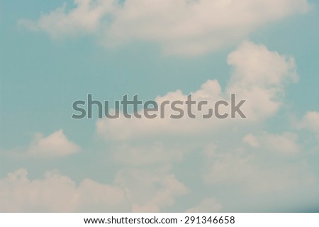 blue sky with clouds vintage retro tone nature background. can fill text and show your product