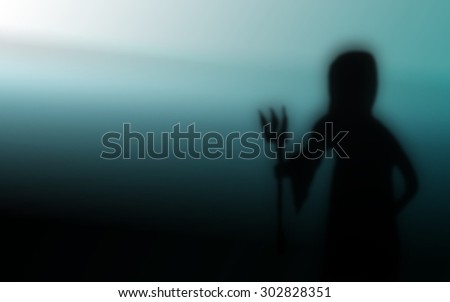 happy Halloween grim reaper dark silhouettes abstract background and use Gaussian blurred effect and can use in poster or fill text