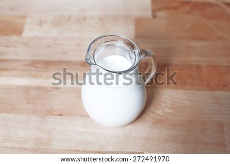 milk jug on table