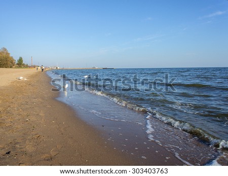 Coastline of the city of Mariupol in the evening. Sea of Azov