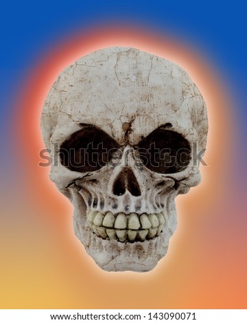 an human skull with some colors like a sunset