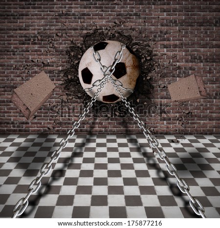a soccer ball with chains destroy a wall