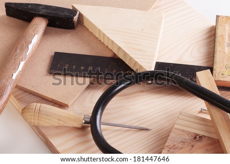 Some carpentry tools on a wooden table