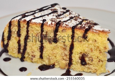 Piece of Corn Cake/ a piece of cake made of corn flour under chocolate icing