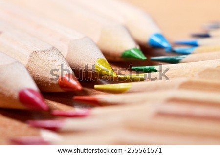 Pencils in Row/a set of pencils positioned in a row