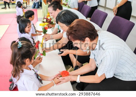 PHUKET THAILAND - JULY 2:  Thai kindergarten celebration Teachers\' Day by giving flower and garlands on July 2, 2015 in Phuket, Thailand