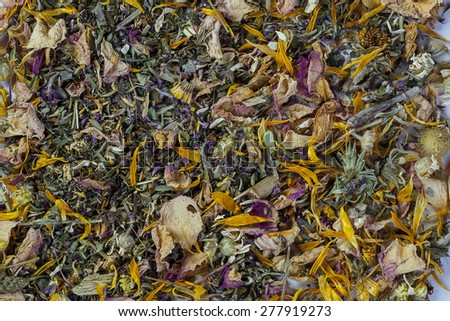 Dried flowers and herbs close up on herbal tea