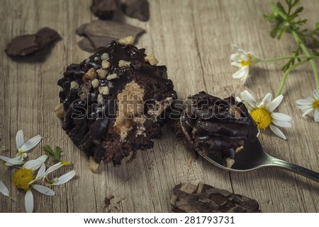 Delicious chocolate truffle cake served on a table, close-up