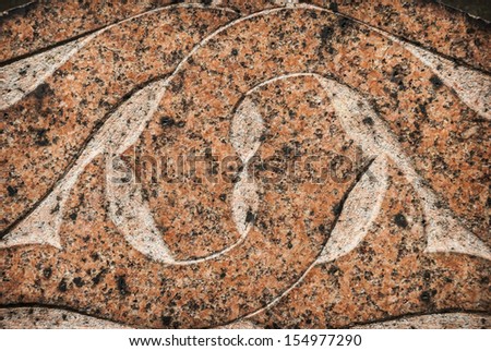 Celtic knot carved into granite