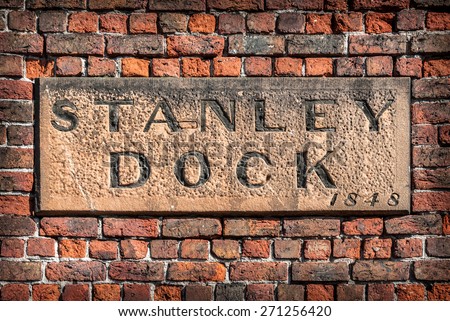 A stone sign on the wall of the historic Stanley Dock tobacco warehouse, Liverpool.