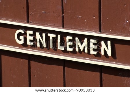 Old Gentlemen Sign At A Train Station